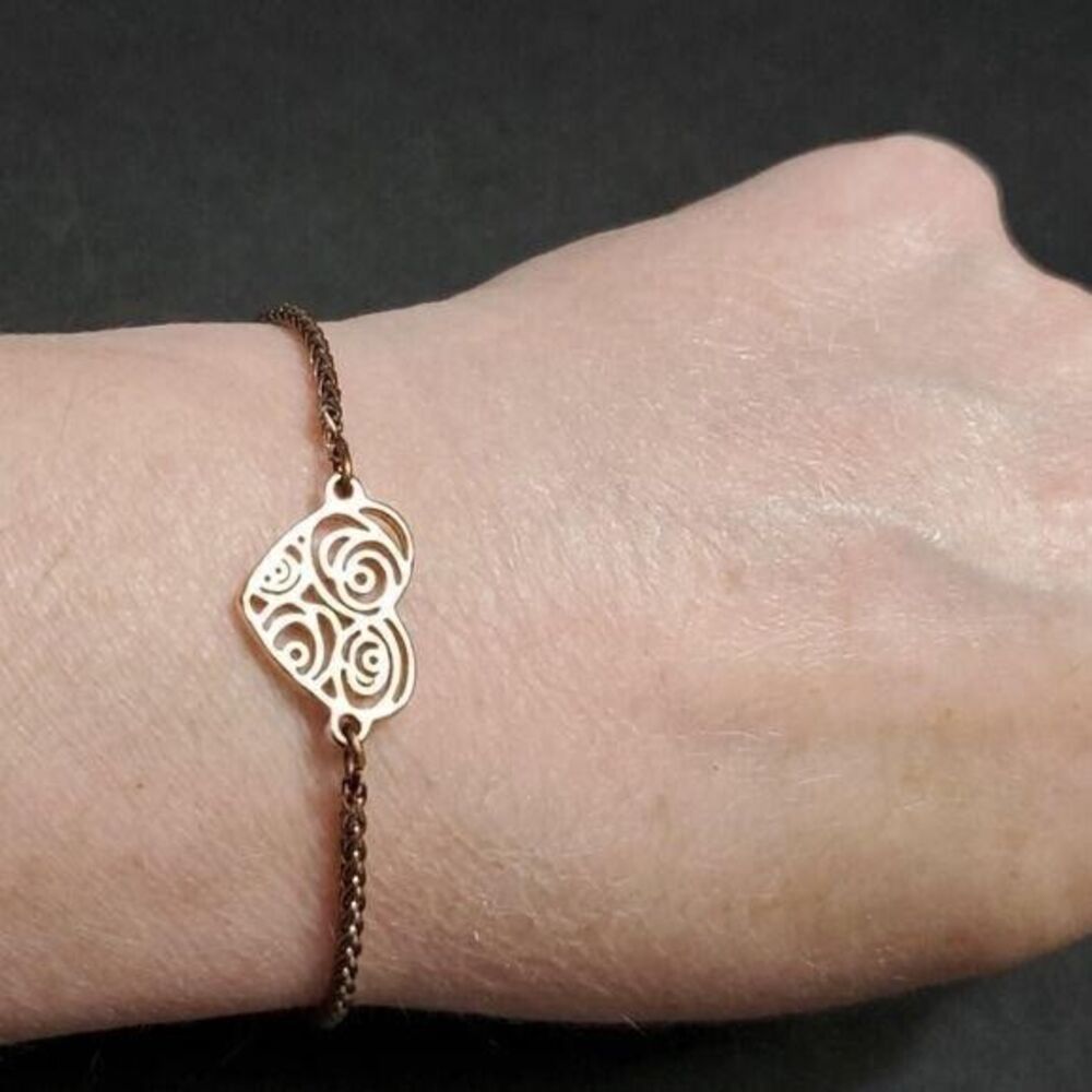 Rose gold tone heart bracelet adjustable up to approx 9.5"